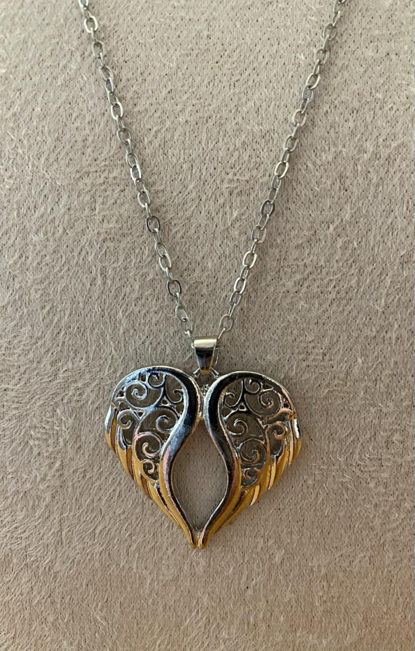 Beautiful Angel Wings Pendant And Chain In A Silver Colour
