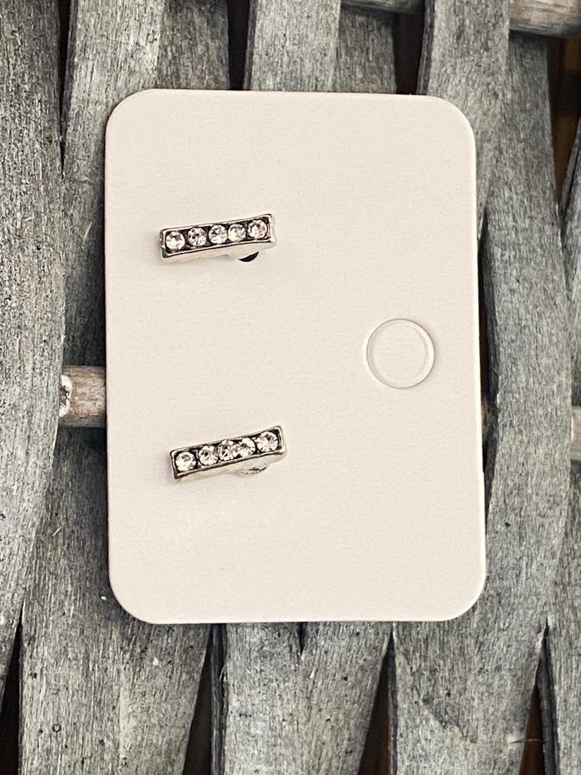 5 Sparkly Rhinestones In A Column Shape