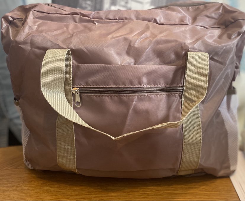 Beige folding suitcase travel bag