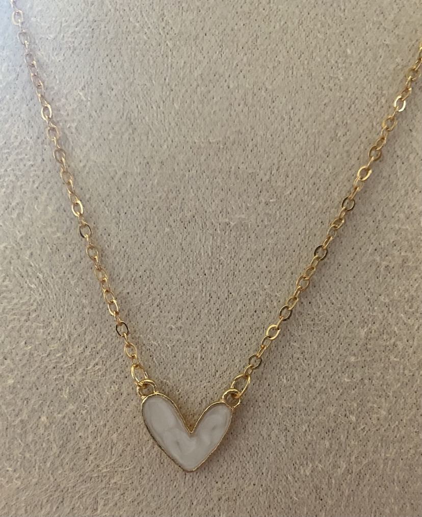 White Love Heart On A Simple Golden Coloured Chain