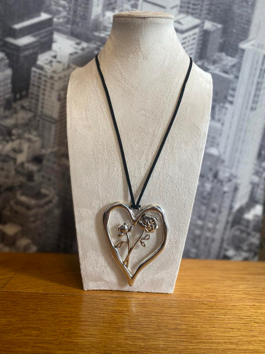 Large Silver Coloured Hollow Heart Rose Detail necklace With Black Cord